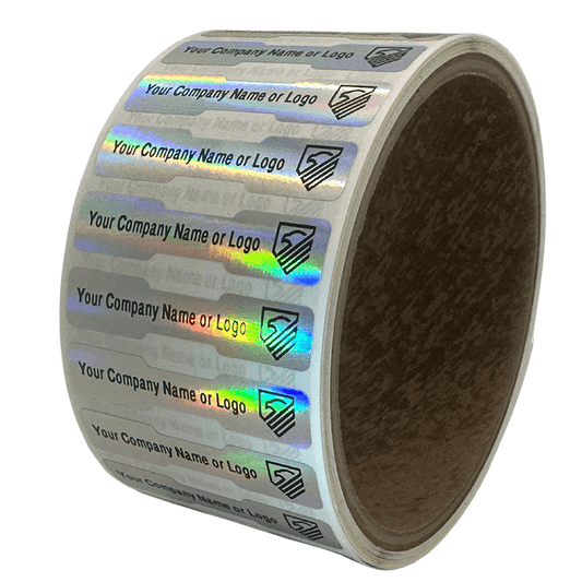 1,000 TamperColor® Holographic Rainbow Color/ Finish Custom Printed Security Labels: Tamper Evident, Dogbone Shape Size 1.75" x 0.375 (44mm x 9mm) >Click on item details to customize.