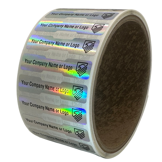 500 TamperColor Holographic Rainbow Color/ Finish Custom Printed Security Labels: Tamper Evident, Dogbone Shape Size 1.75" x 0.375 (44mm x 9mm) >Click on item details to customize.