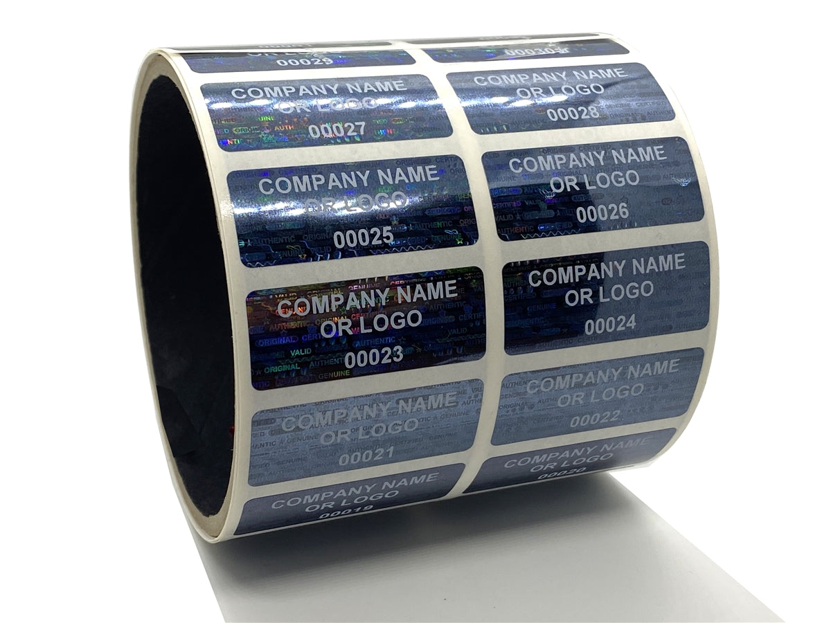 10,000 Black Tamper Evident Security Hologram Blue Label Seal Sticker, Rectangle 1" x 0.5" (25mm x 13mm). CustomPrinted. >Click on item details to Customize.