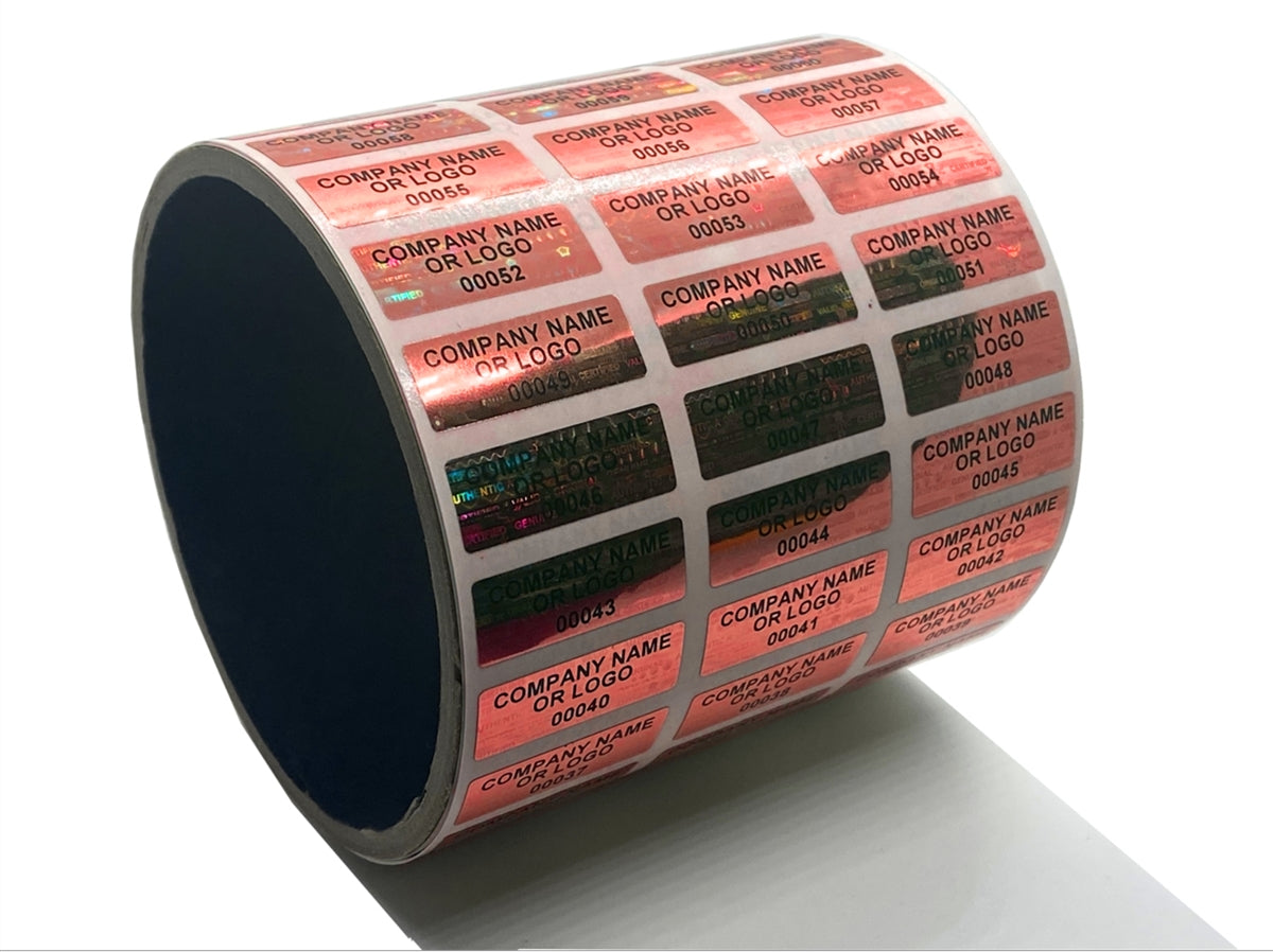 500 Red Tamper Evident Security Holographic Label Seal Sticker, Rectangle 1" x 0.5" (25mm x 13mm). CustomPrinted. >Click on item details to Customize.
