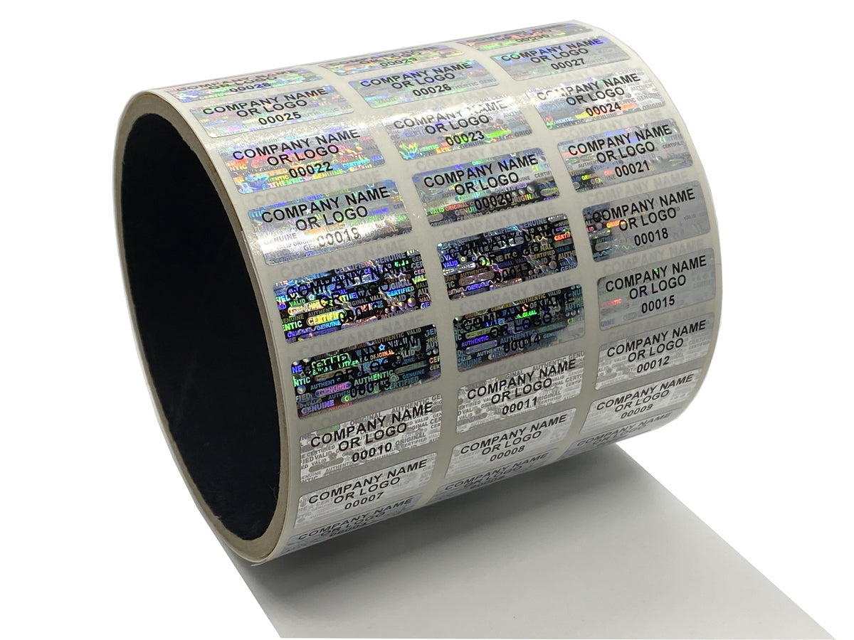 5,000 Silver Tamper Evident Security Hologram Label Seal Sticker, Rectangle 0.75" x 0.25" (19mm x 6mm). CustomPrinted. >Click on item details to Customize.