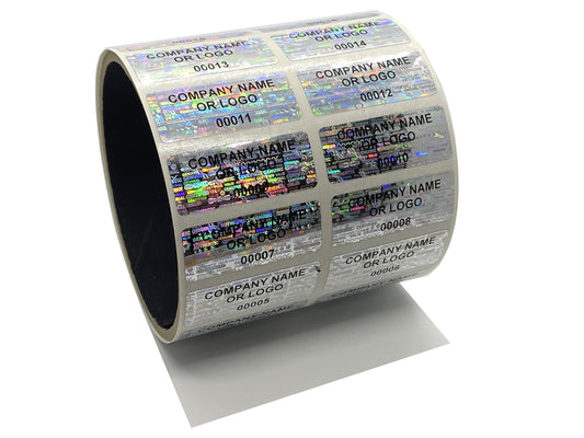 10,000 Silver Tamper Evident Security Holographic Silver Label Seal Sticker, Rectangle 1.5" x 0.6" (38mm x 15mm). CustomPrinted. >Click on item details to Customize.