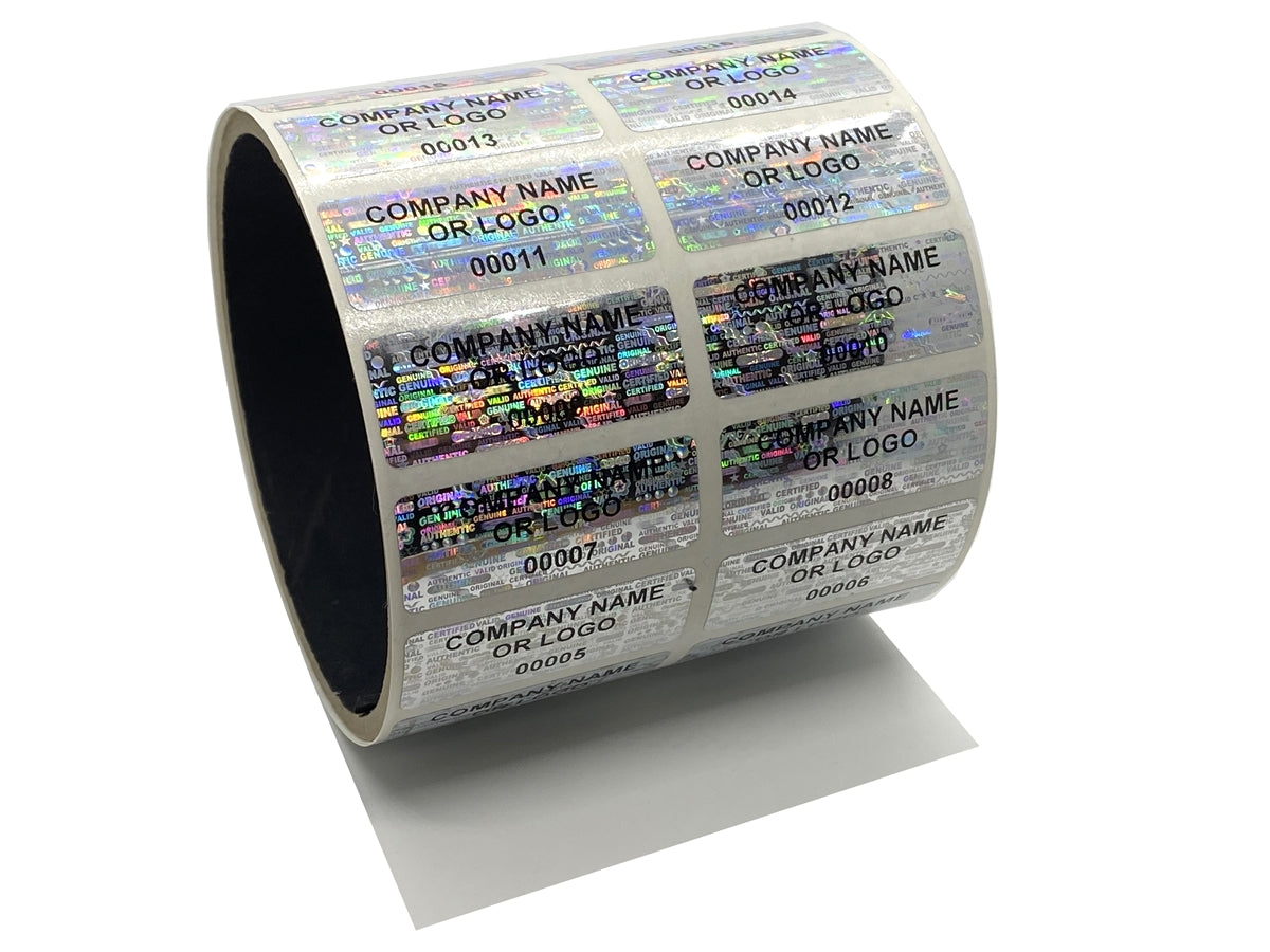500 Silver Tamper Evident Security Hologram Label Seal Sticker, Rectangle 1.5" x 0.6" (38mm x 15mm). CustomPrinted. >Click on item details to Customize.
